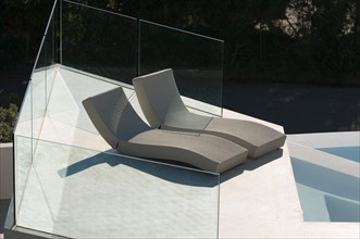 Custom luxury pool and chairs abstract