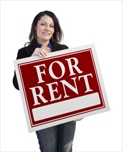 Smiling hispanic woman holding for rent sign isolated on white