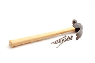 Hammer and nails isolated on a white background