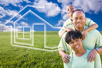 Happy african american family over grass field