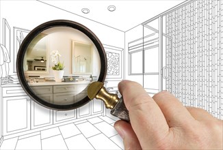 Hand holding magnifying glass revealing custom bathroom design drawing and photo combination