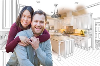 mixed-race caucasian and chinese couple in front of custom kitchen drawing and photo combination
