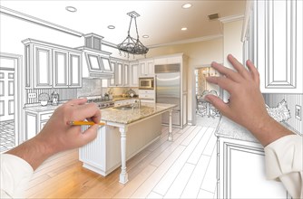 Male hands sketching with pencil A custom kitchen with photo showing through