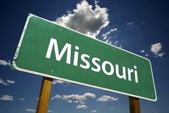 Missouri road sign with dramatic clouds and sky
