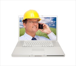 Laptop and man with hard hat on cell phone extruding the screen