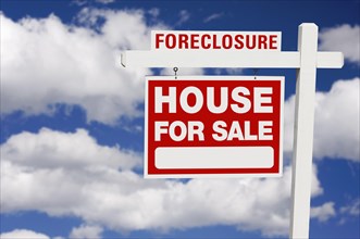 Foreclosure home for sale real estate sign on clouds