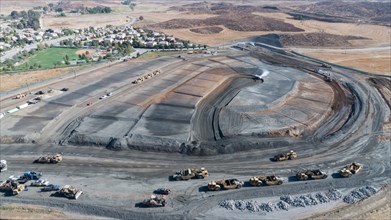 Aerial view of tractors on A housing development construction site