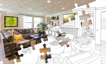 Puzzle pieces fitting together revealing finished living room build over drawing