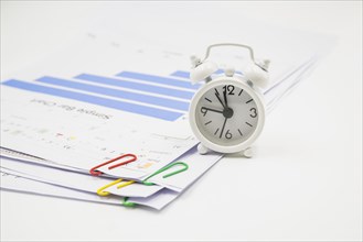 Alarm clock papers with clips