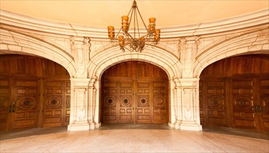 Three majestic classic arched doors with chandelier