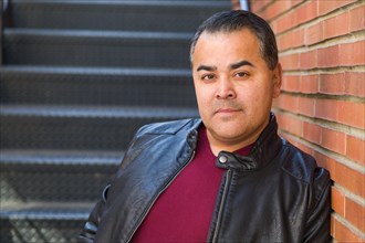 Headshot portrait of handsom hispanic man