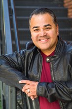 Headshot portrait of handsom hispanic man