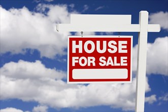 Home for sale real estate sign on clouds with blank section
