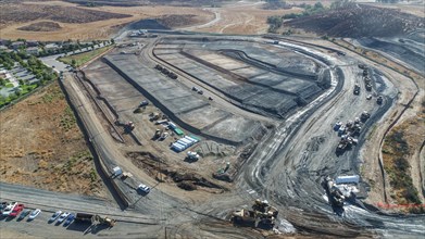 Aerial view of tractors on A housing development construction site