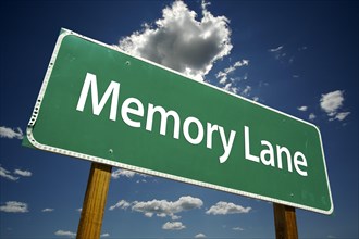 Memory lane road sign with dramatic clouds and sky