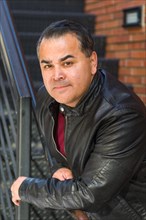 Headshot portrait of handsom hispanic man