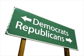 Democrats and republicans green road sign isolated on a white background with clipping path