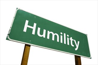 Humility green road sign isolated on a white background with clipping path