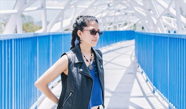 Portrait of urban girl on a bridge