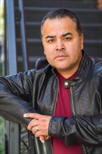 Headshot portrait of handsom hispanic man