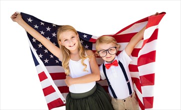 Cute young cuacasian boy and girl holding american flag isolated on white background