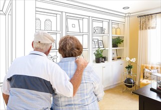 Senior couple facing custom built-in shelves and cabinets design drawing gradating to finished photo