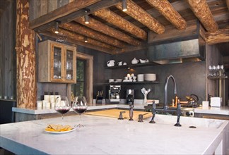 Luxurious rustic fully equipped log cabin kitchen