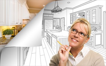 Woman facing kitchen drawing page corner flipping with photo behind