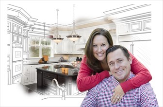 Happy couple with kitchen design drawing and photo behind