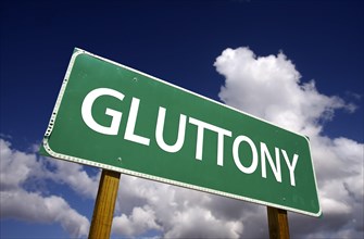 Gluttony road sign