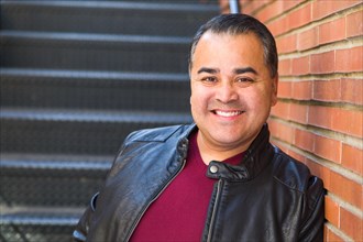 Headshot portrait of handsom hispanic man