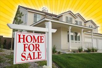 Home for sale sign with yellow star-burst background in front of new house