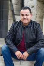 Headshot portrait of handsom hispanic man