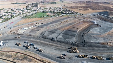 Aerial view of tractors on A housing development construction site
