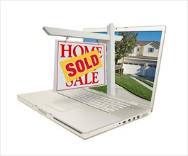 Red sold home for sale sign on laptop isolated on a white background