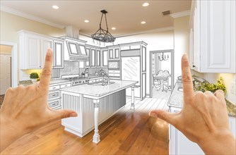 Female hands framing custom kitchen design drawing and square photo combination