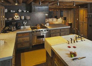 Luxurious rustic fully equipped log cabin kitchen