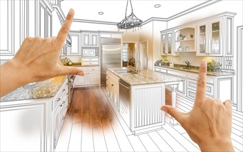 Female hands framing custom kitchen design drawing and photo combination
