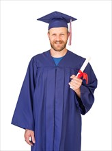 Caucasian male with deploma wearing graduation cap and gown isolated