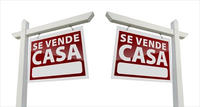 Two spanish house for sale real estate signs with clipping paths isolated on a white background