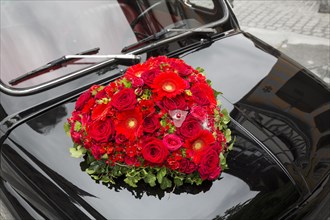 Heart of flowers on car