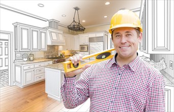 Smiling contractor in hard hat with level over custom kitchen drawing and photo combination