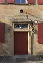 Entrance door of the historic vicarage from 1733