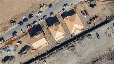 Drone aerial view of home construction site early stage