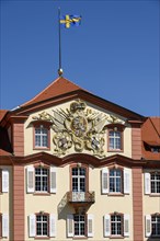 Palace facade with coat of arms
