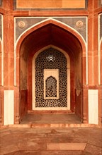 Arch with carved marble window Mughal style Humayun's tomb