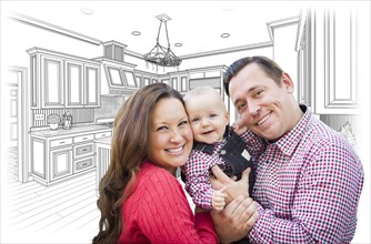 Happy young family over custom kitchen and design drawing