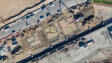 Drone aerial view of home construction site early stage