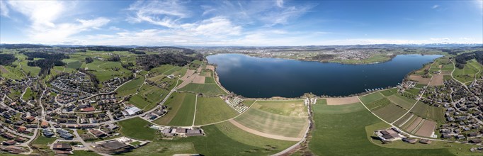 Large 360 degree panorama of Lake Greifen with the towns of Maur and Uster