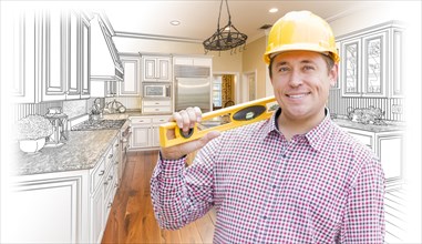 Smiling contractor in hard hat with level over custom kitchen drawing and photo combination